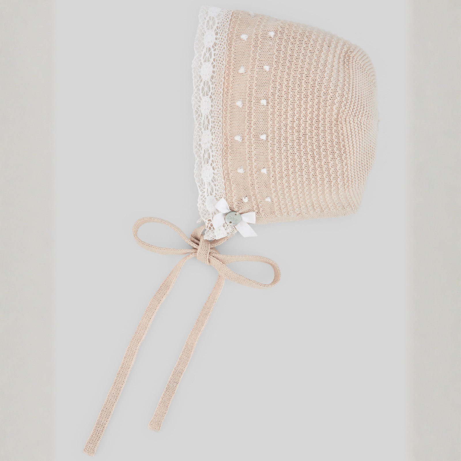 Touca recém nascido em malha bege da Paz Rodriguez "Nectar"