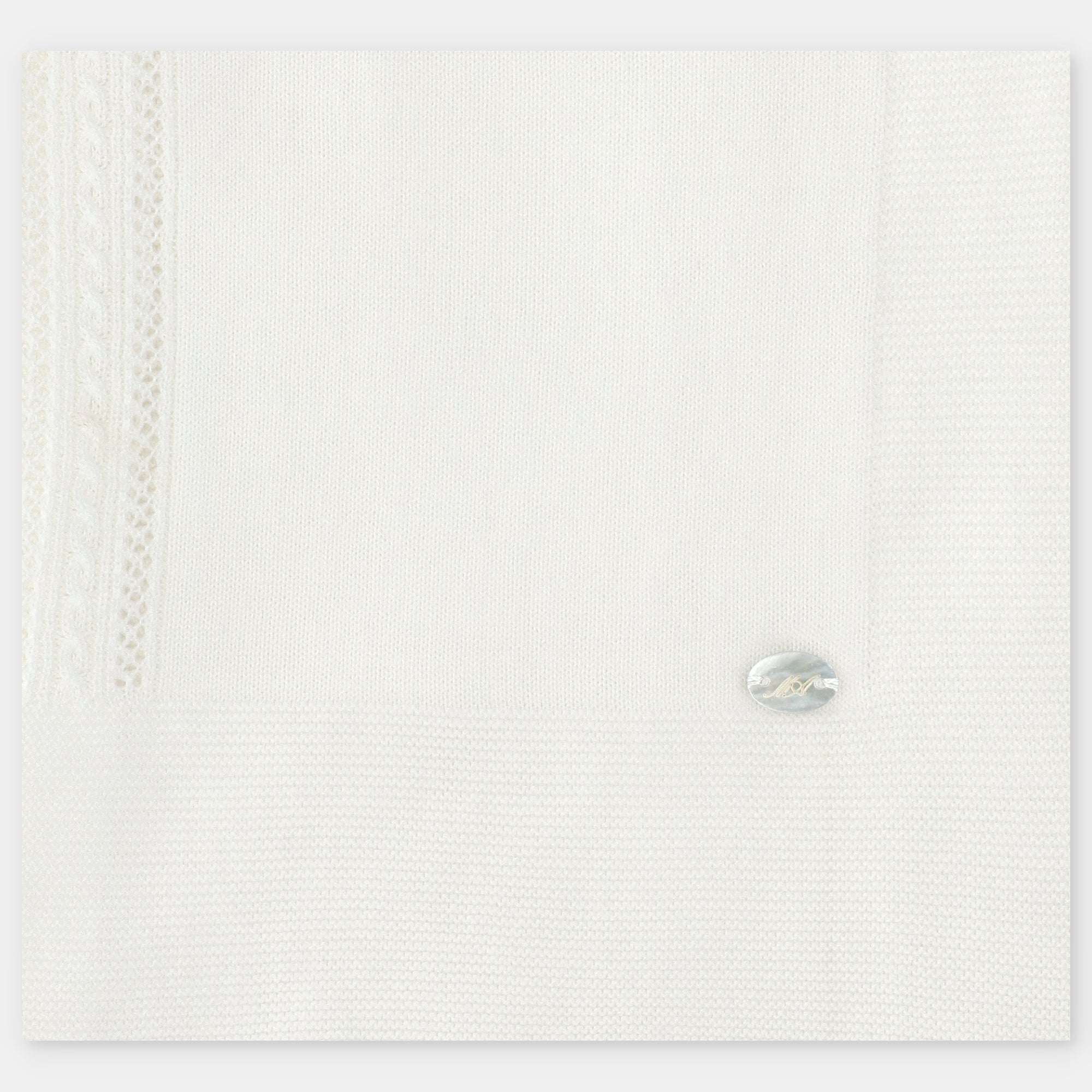 Manta para recem-nascido em malha branca da Martín Aranda "Regina"