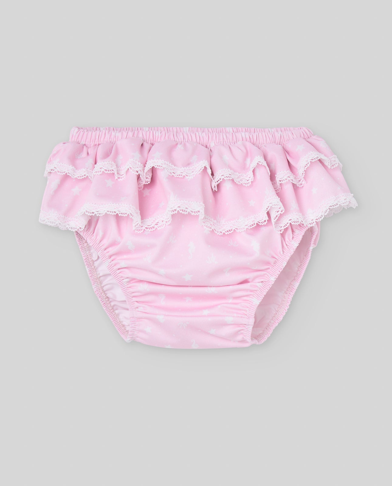 Conjunto t-shirt branca e cueca de banho rosa da Paz Rodriguez "Baño"