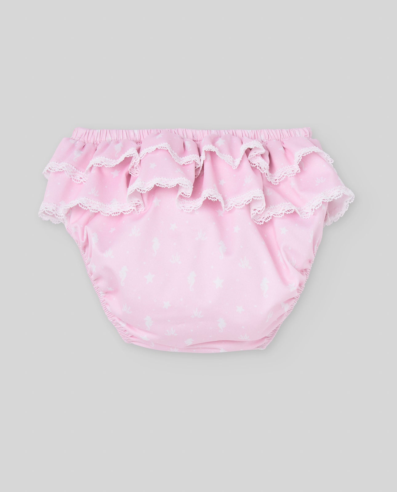 Conjunto t-shirt branca e cueca de banho rosa da Paz Rodriguez "Baño"