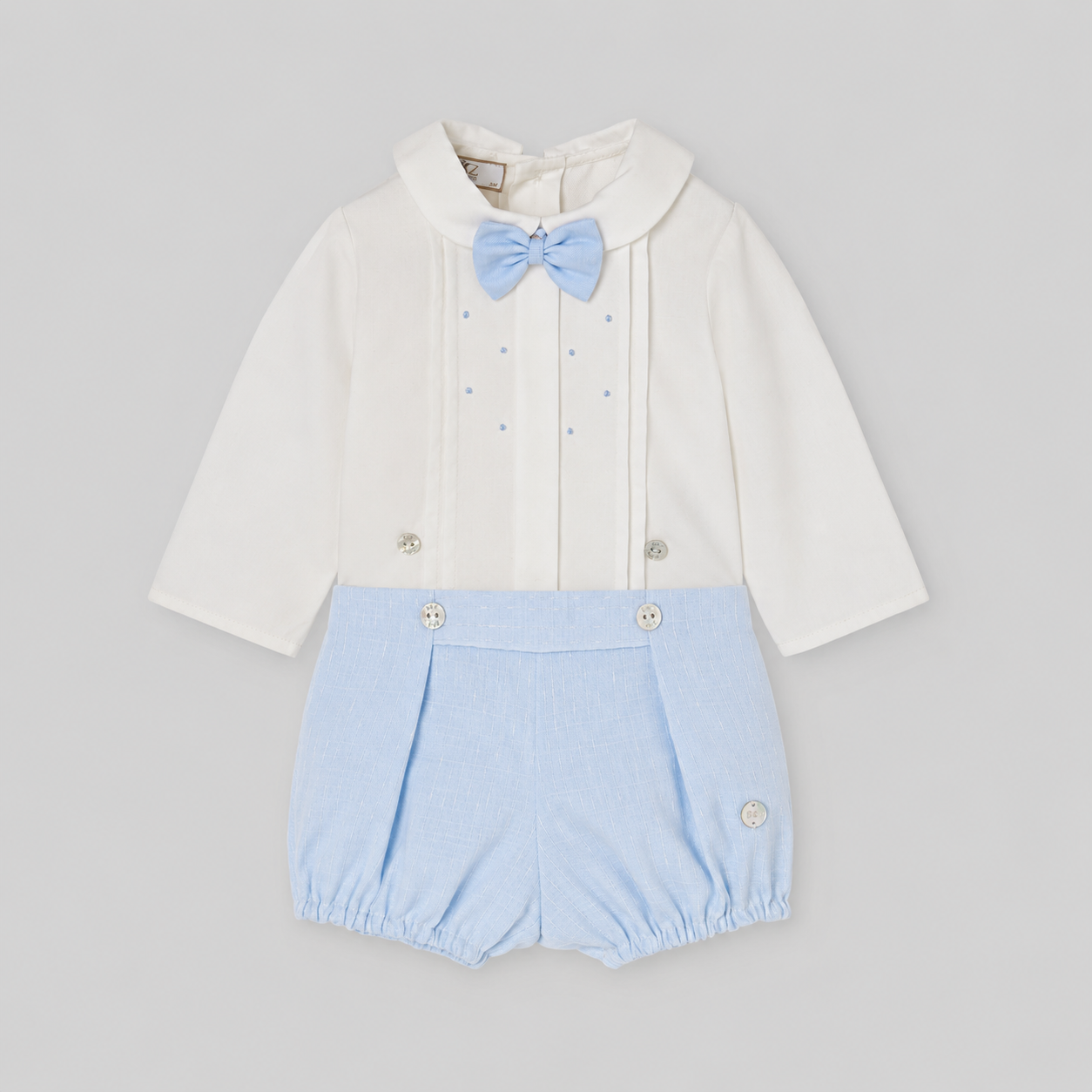 Conjunto cerimónia blusa pérola e calção azul da Paz Rodriguez "Fogar"