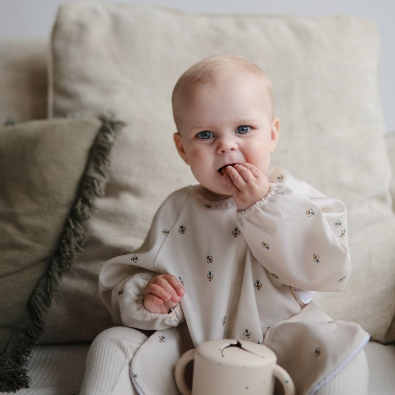 Babete com mangas da Mushie "Bees"