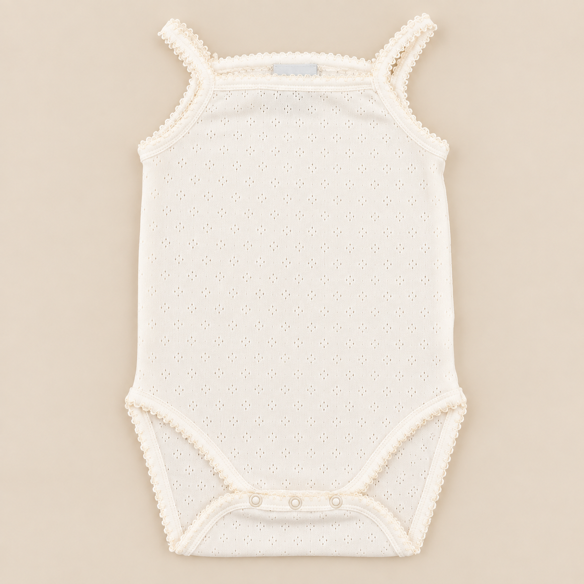 Body perola picotado de alças da The Baby Concept