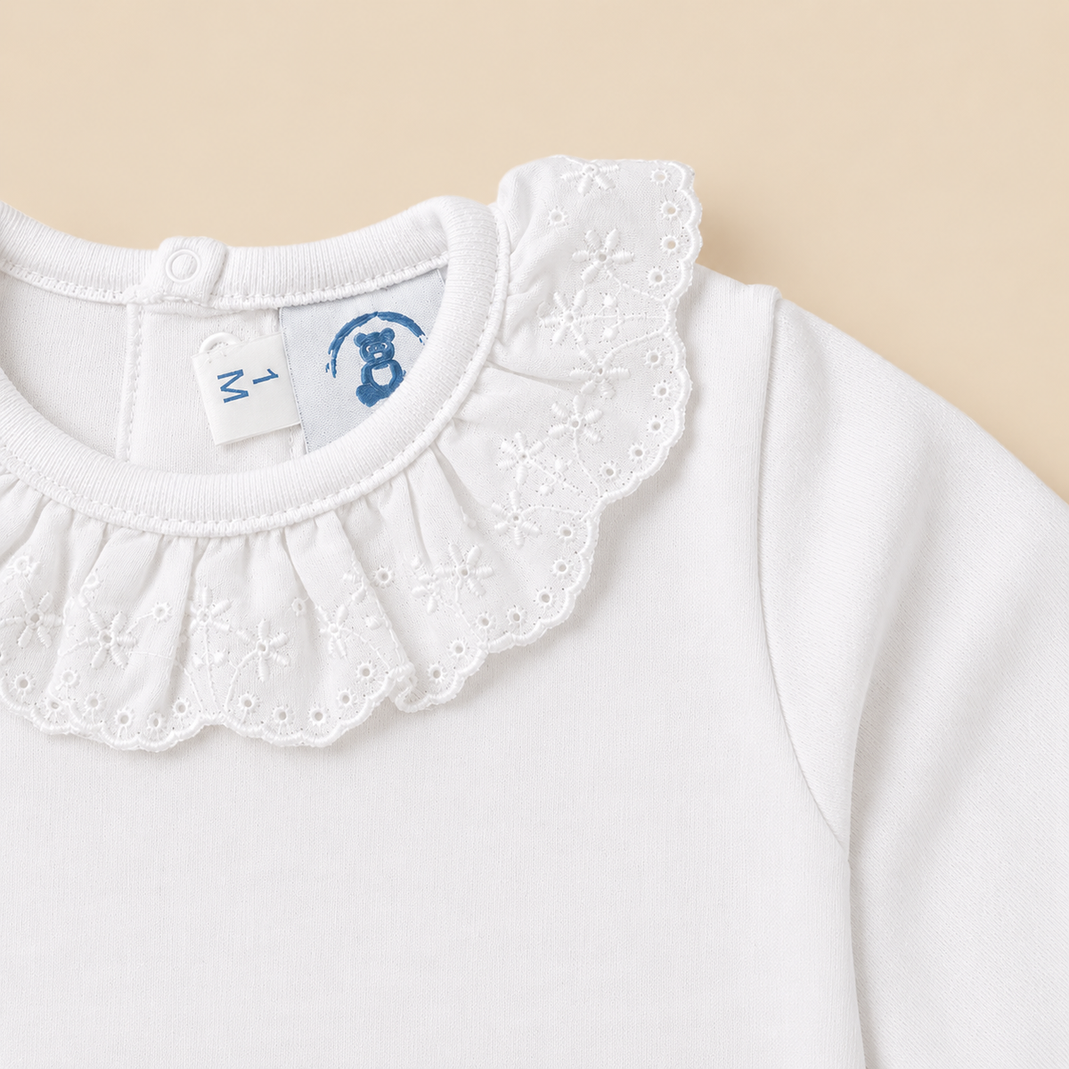 Body branco bordado inglês da The Baby Concept