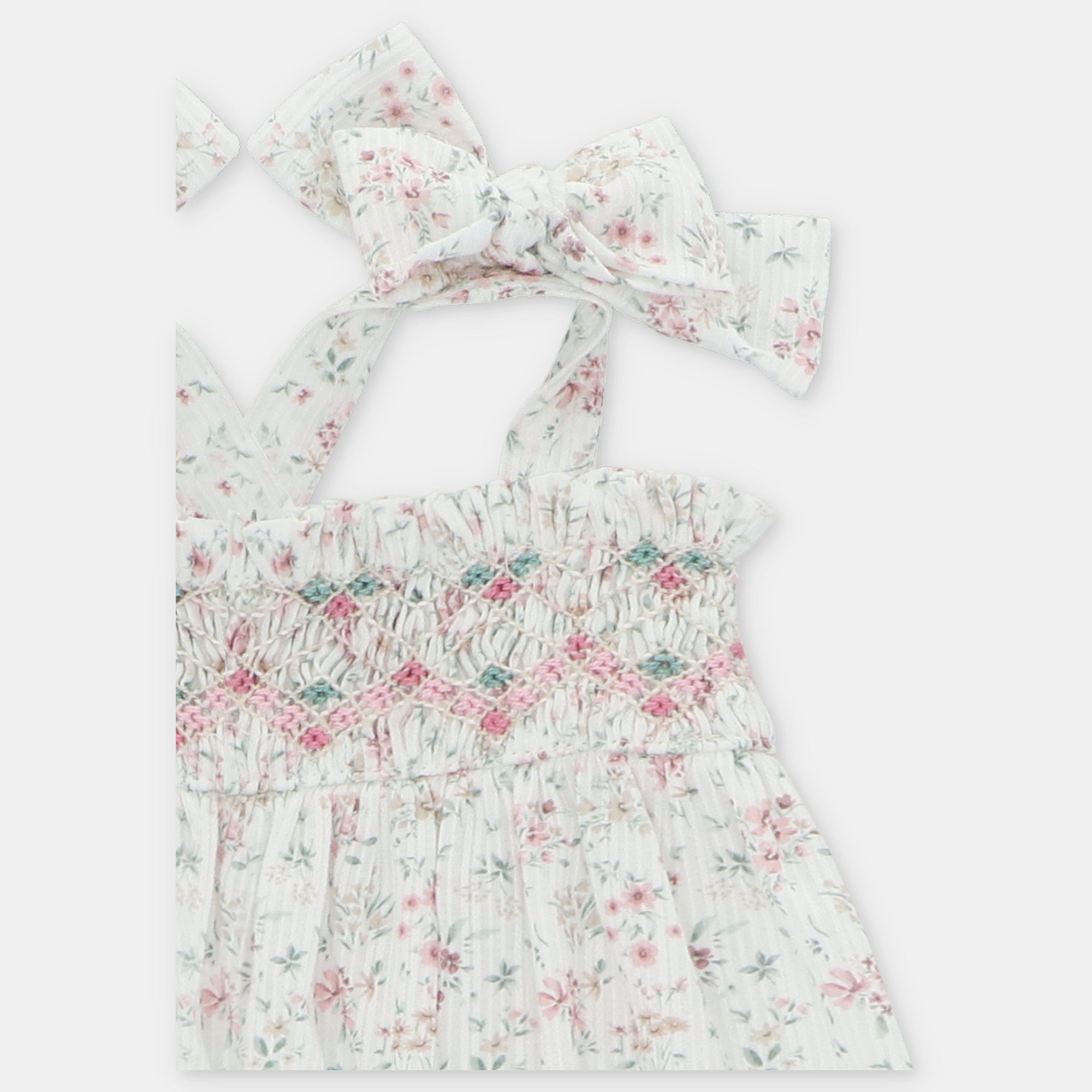 Jardineira floral com favos de mel para bebe da Martín Aranda "Toronto"