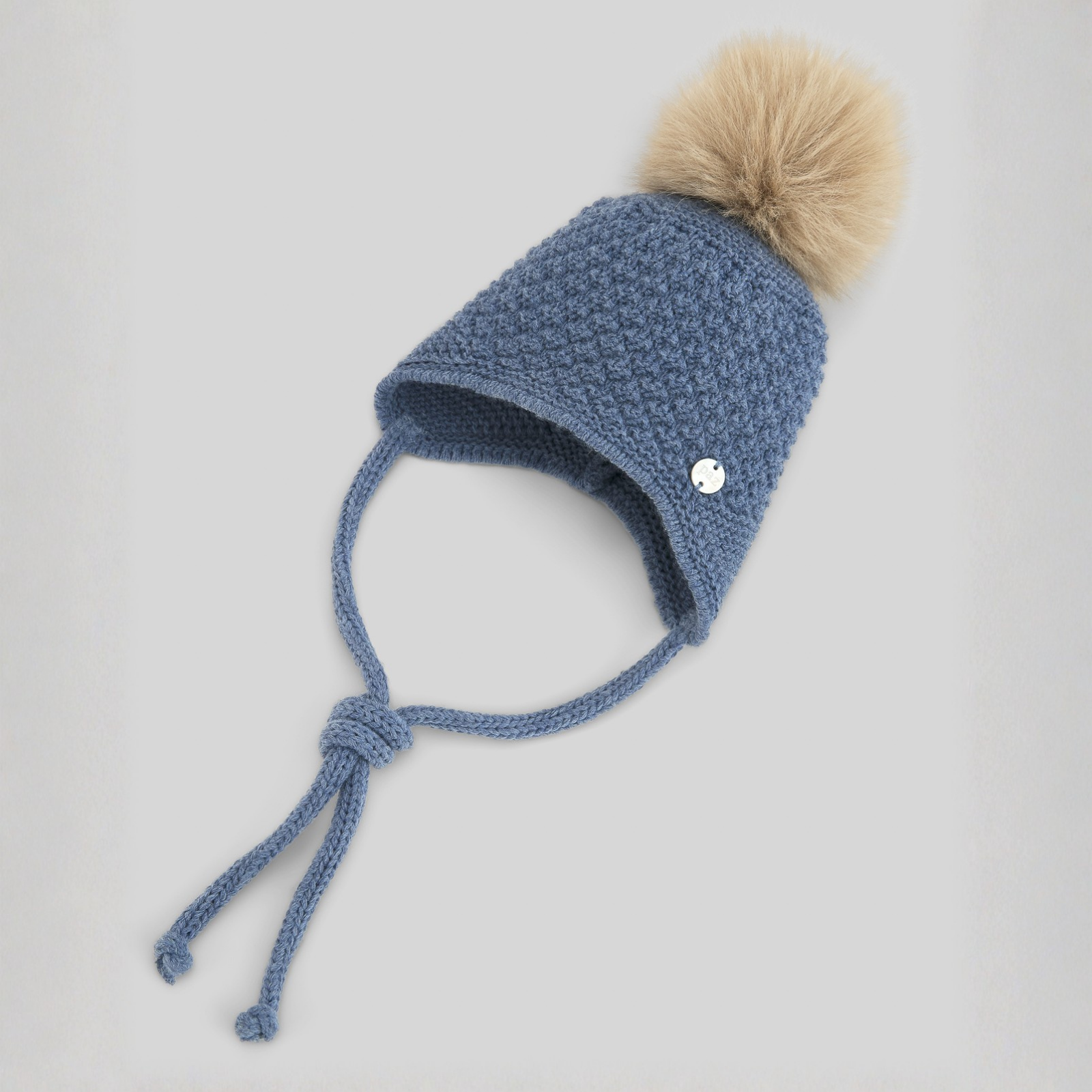 Gorro com pompom azul da Paz Rodriguez "Ponte"