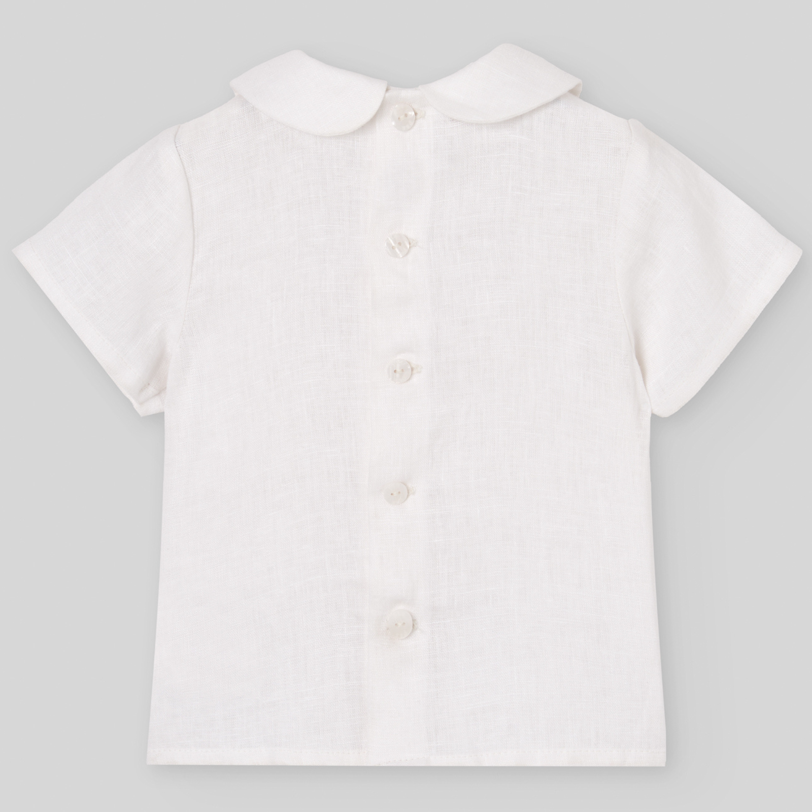 Conjunto camisa branca e calção com alças azuis da Paz Rodriguez "Cerimónia"