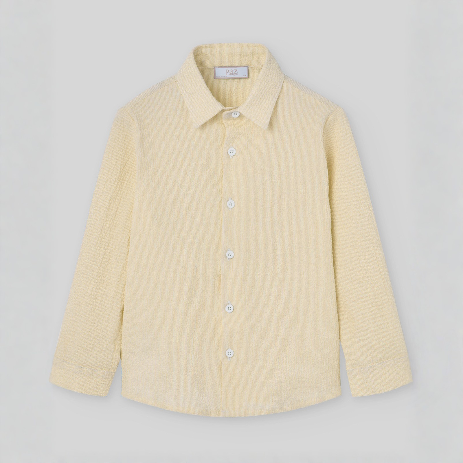 Conjunto camisa amarela e calção branco da Paz Rodriguez "Candy"