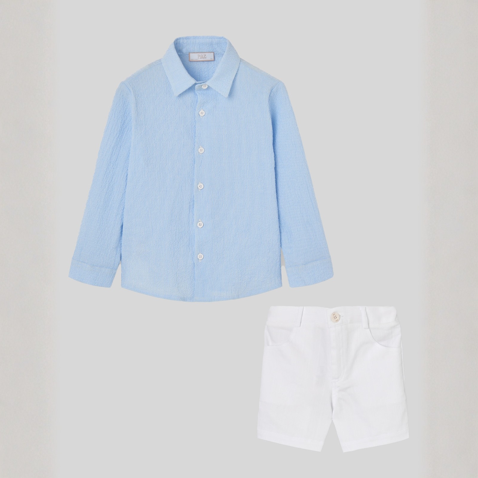 Conjunto camisa azul e calção branco da Paz Rodriguez "Candy"