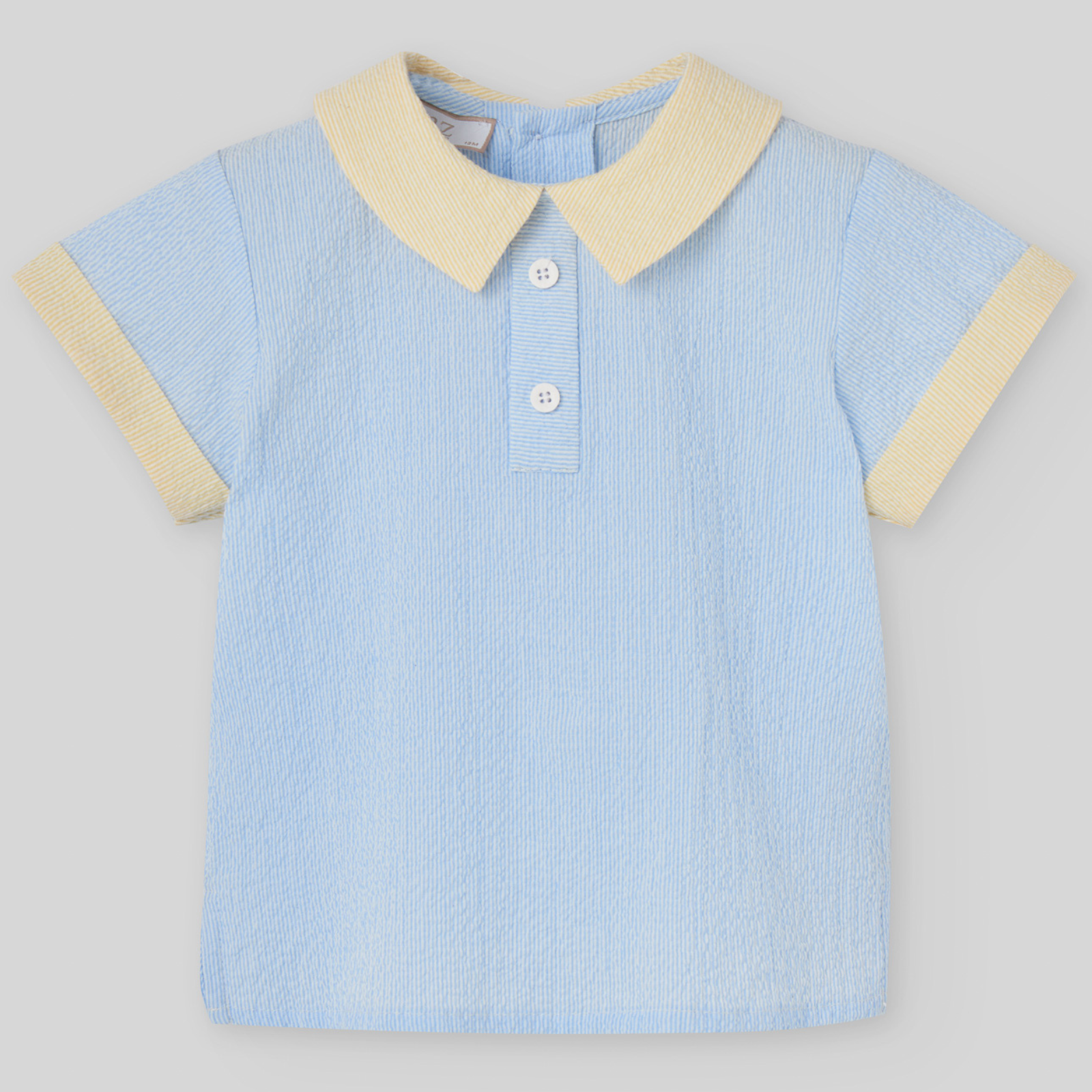 Conjunto polo azul e calção branco da Paz Rodriguez "Candy"