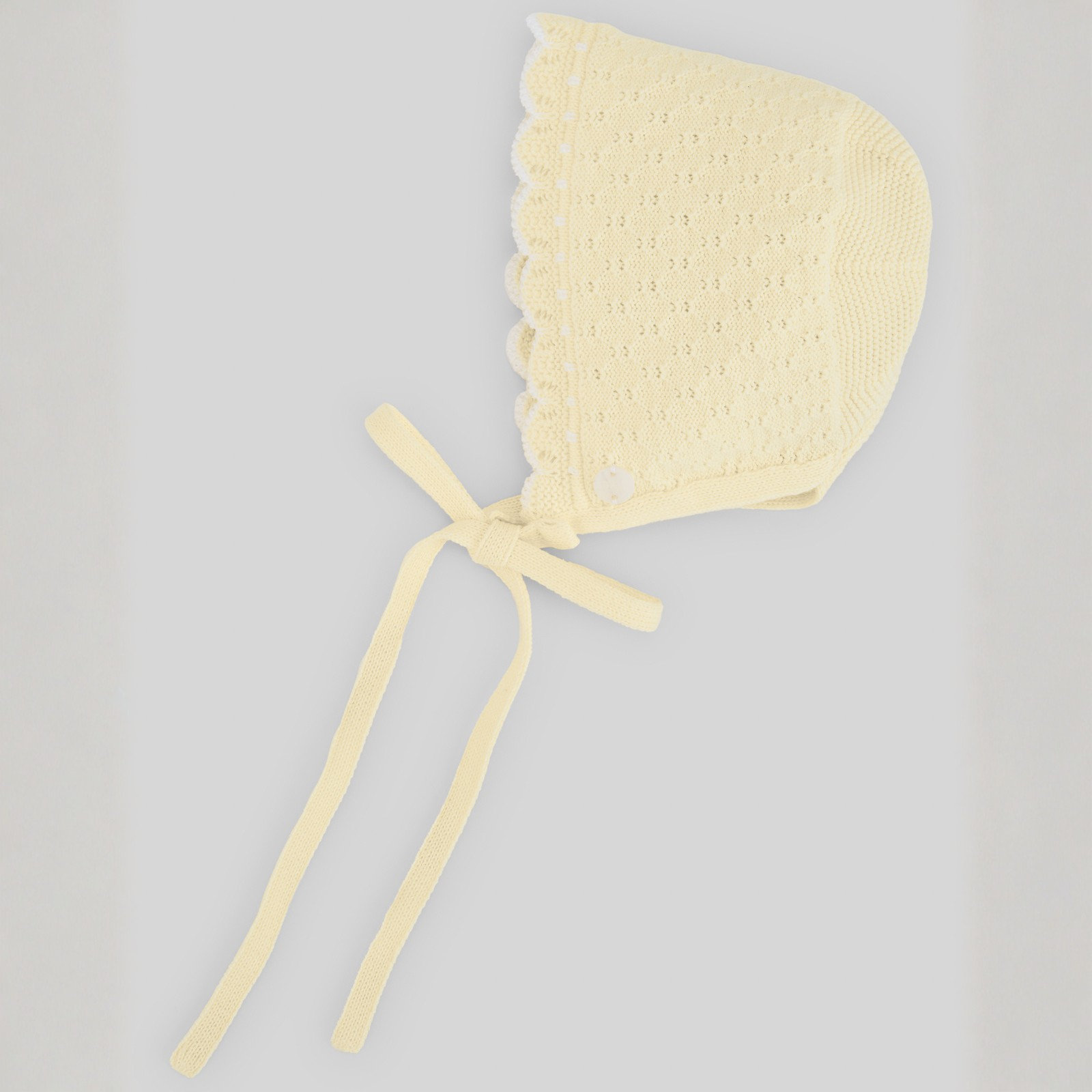 Touca recém nascido em malha amarelo da Paz Rodriguez "Albor"