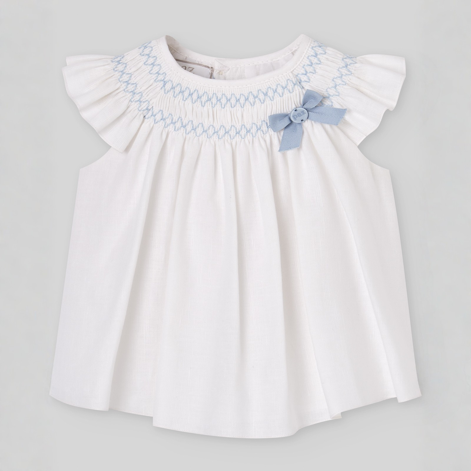 Vestido branco e tapa fralda azul da Paz Rodriguez "Espuma"