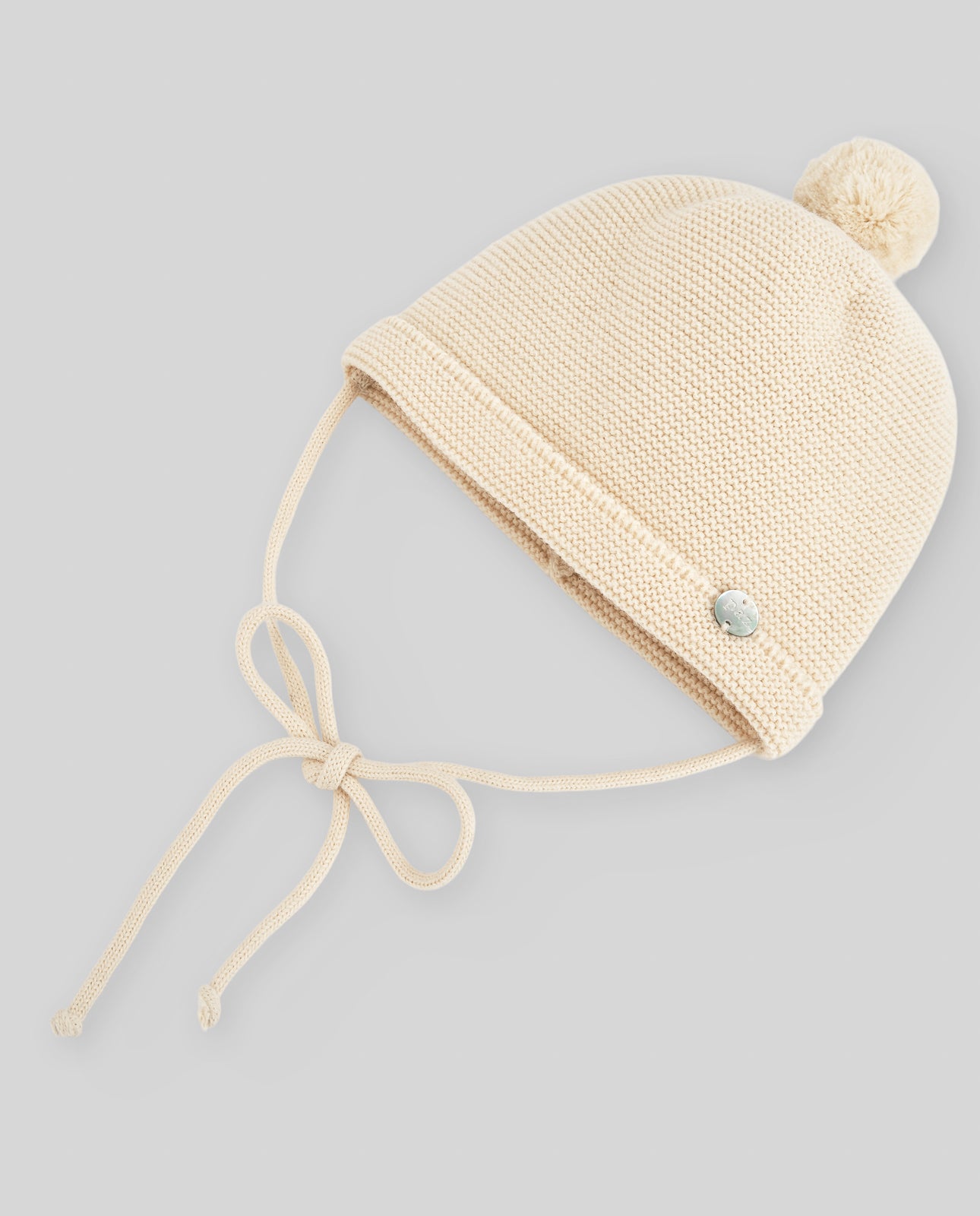 Gorro com pompom bege da Paz Rodriguez "Mel"