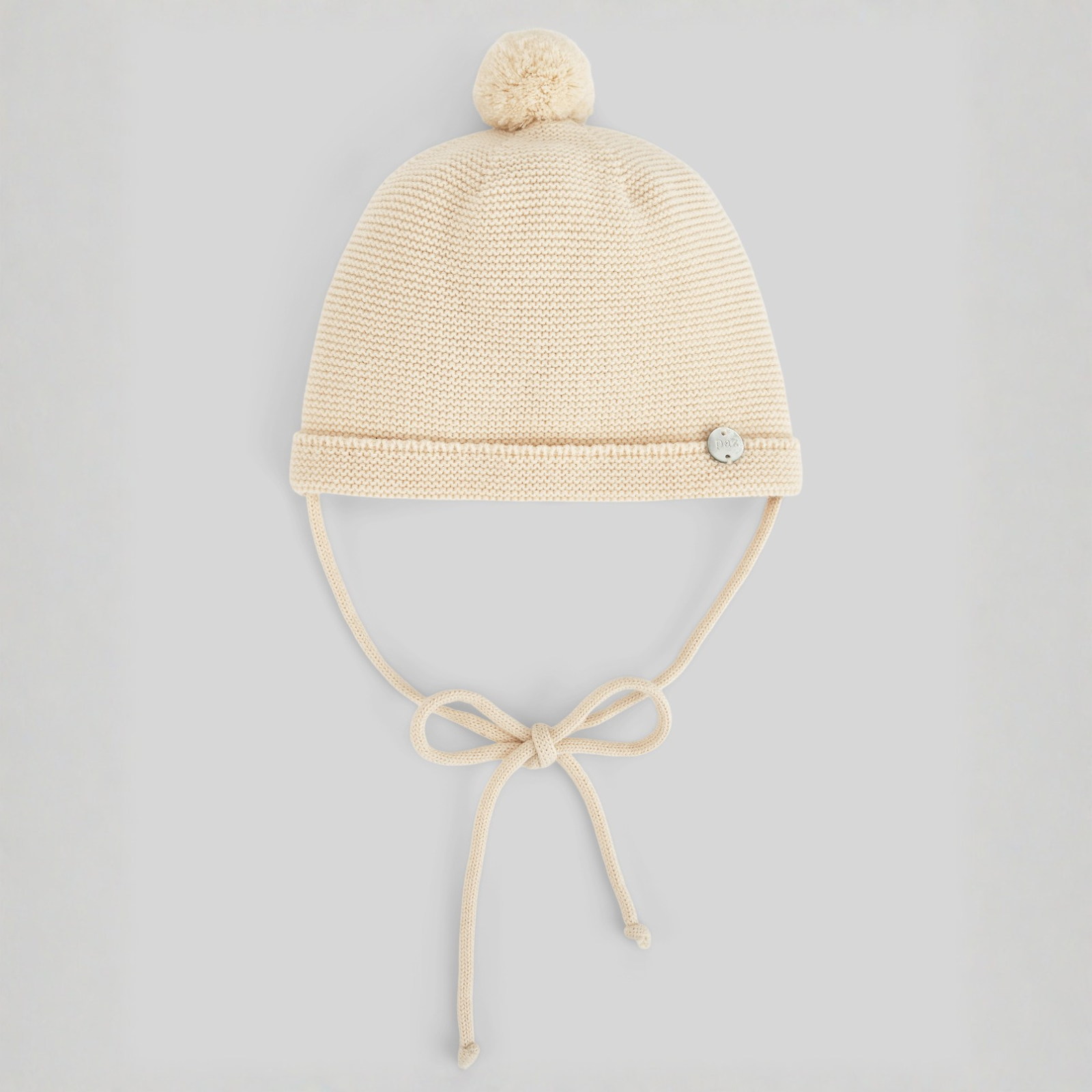 Gorro com pompom bege da Paz Rodriguez "Mel"