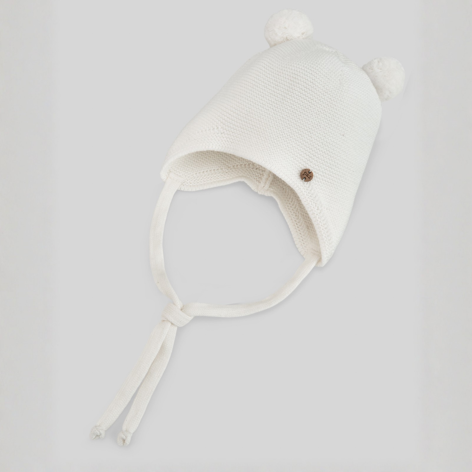 Gorro com pompons em malha pérola da Paz Rodriguez "Rula"