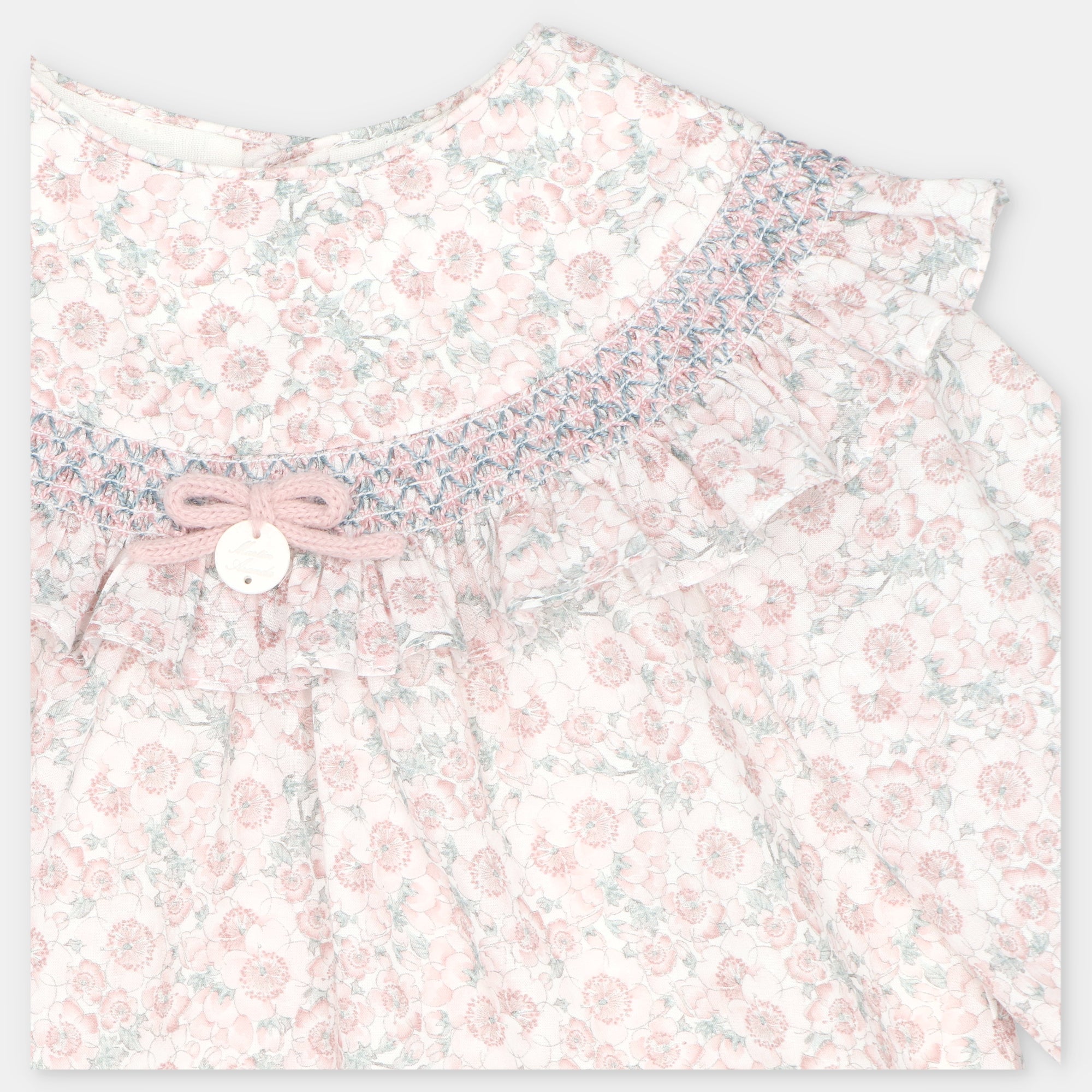 Vestido e tapa fraldas floral rosa da Martín Aranda "Lena"