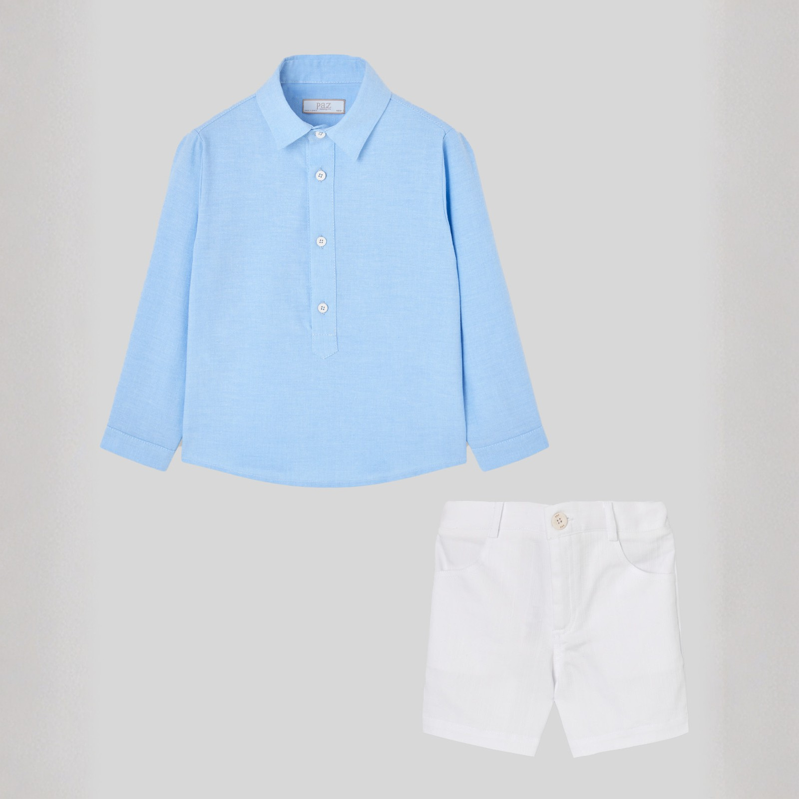 Conjunto camisa azul e calção branco da Paz Rodriguez "Corales"