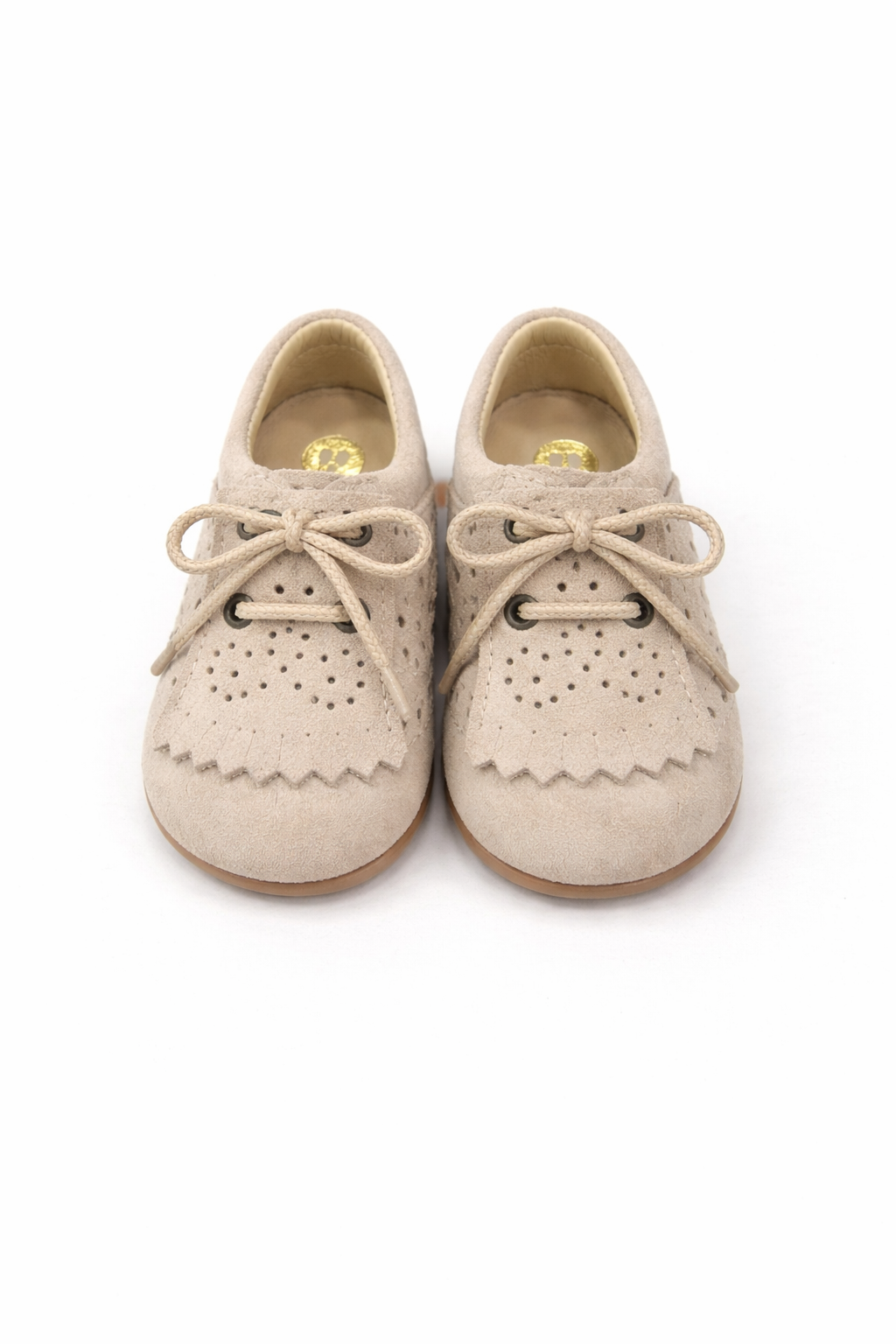 Sapatos bege estilo caneiras com franja da Mania do Pé