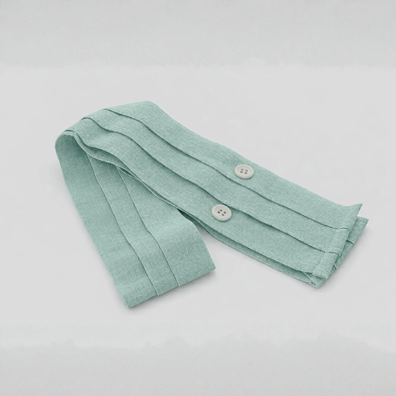 Faixa de linho verde água para menino da Niseret