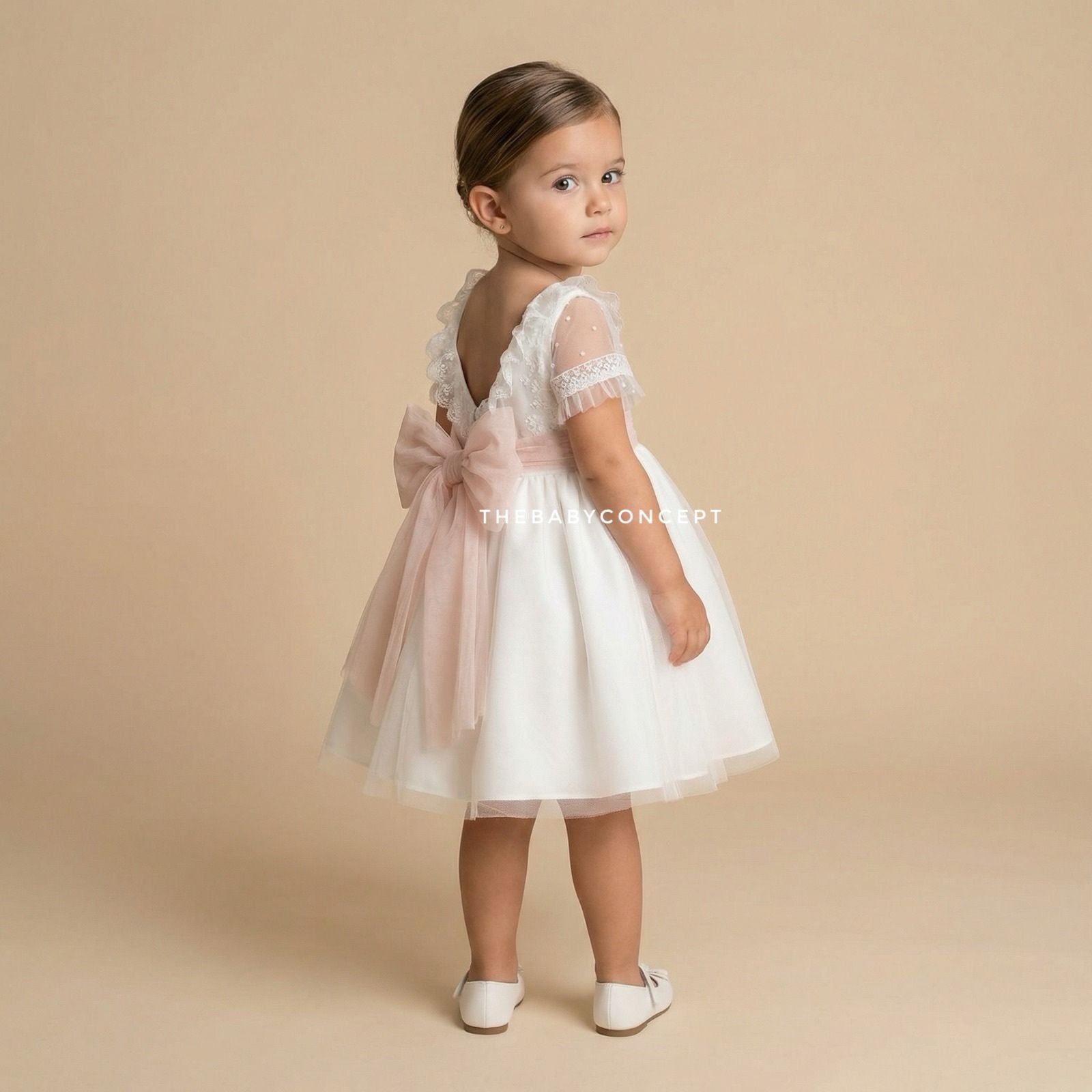 Vestido cerimónia tule com faixa rosa da Niseret