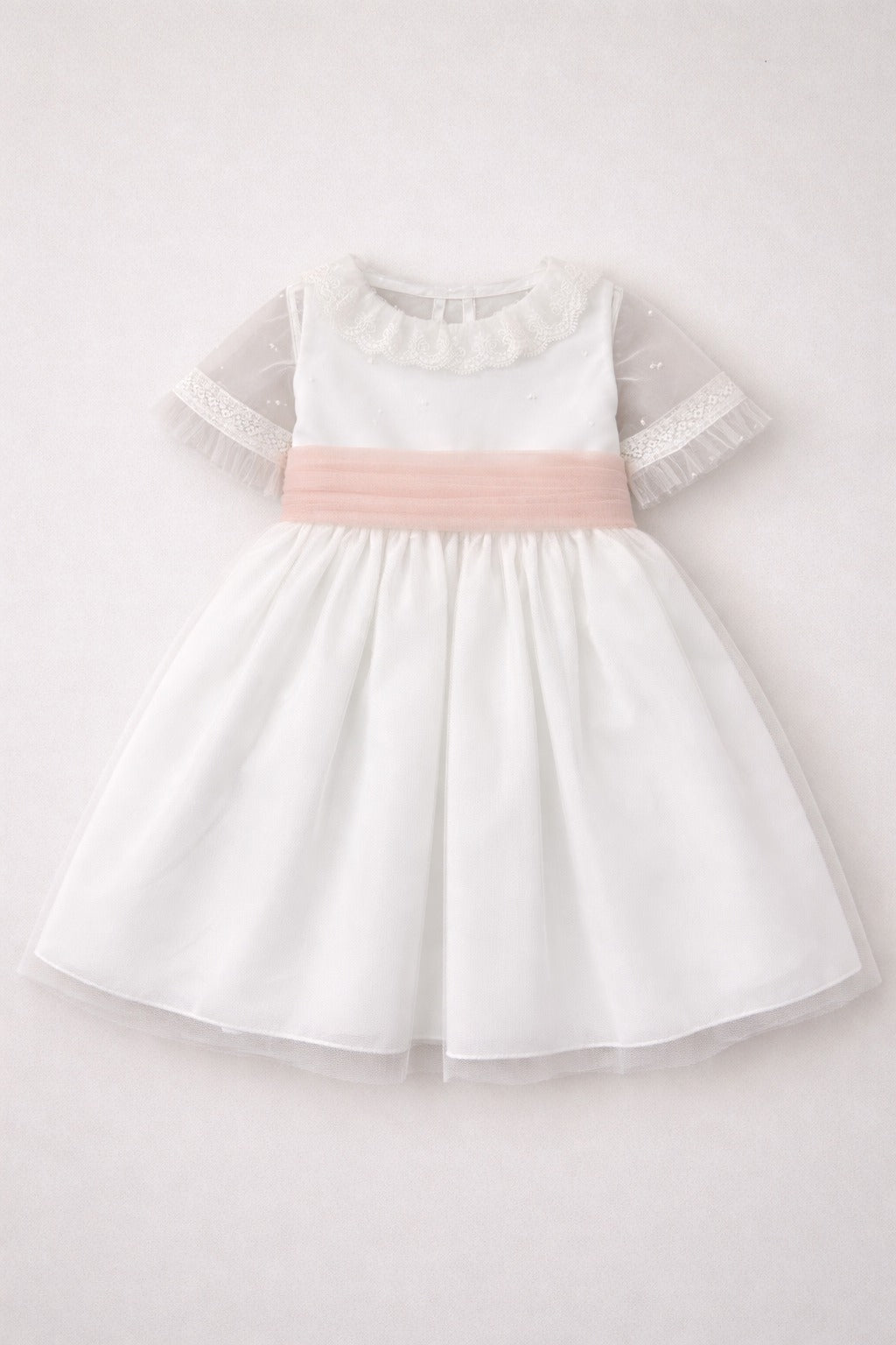 Vestido cerimónia tule com faixa rosa da Niseret