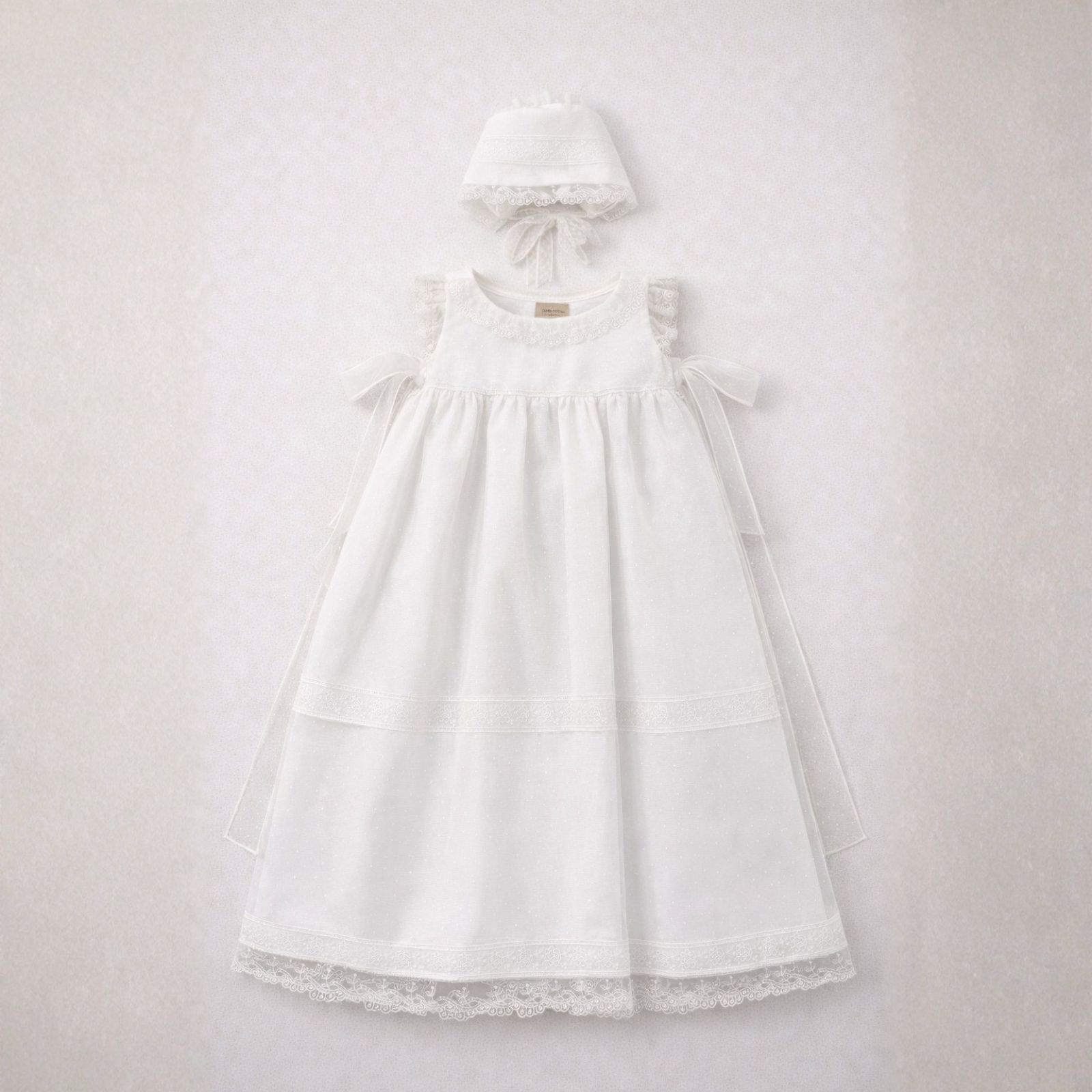 Fraldão pérola de cerimonia com pontinhos e renda da Niseret