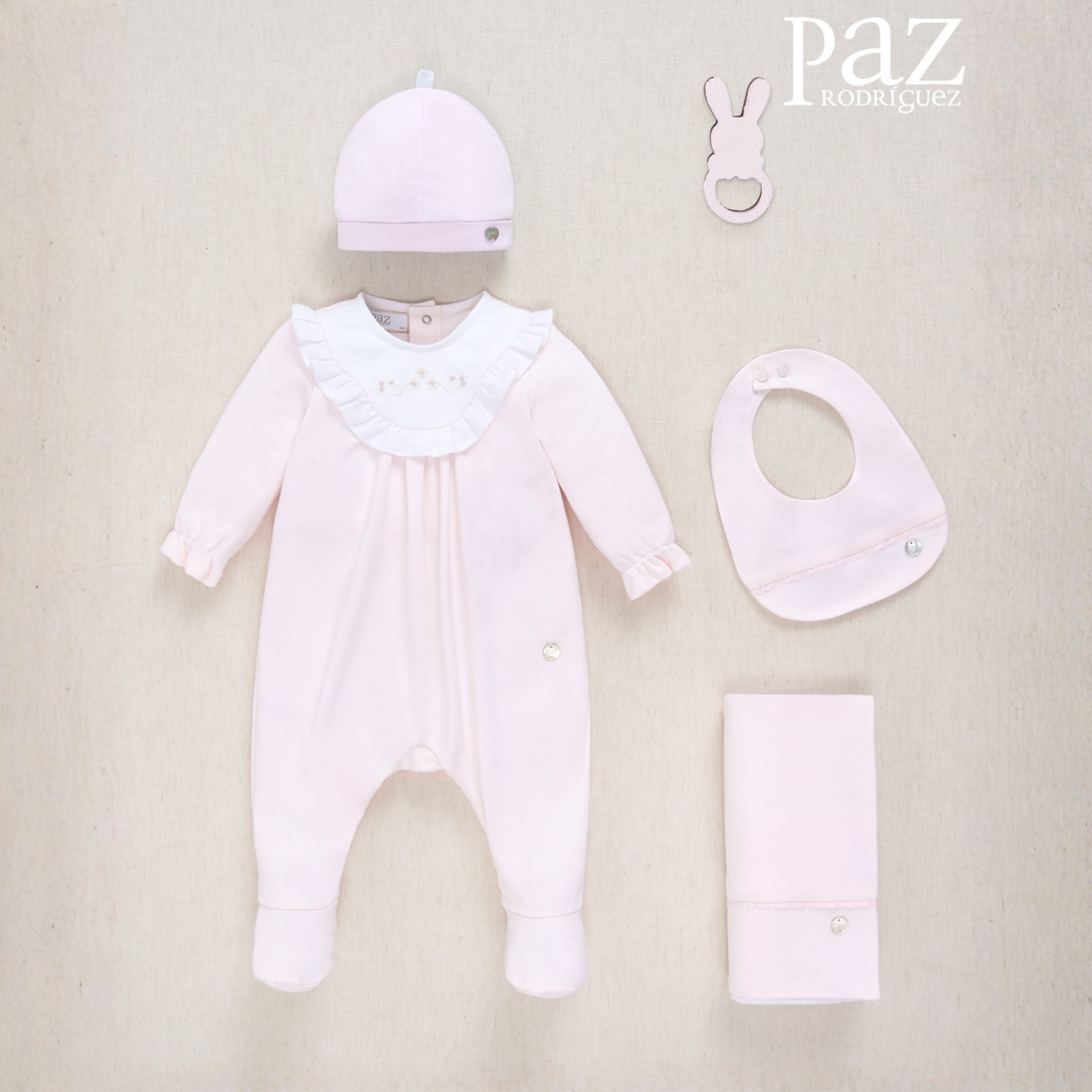 Babygrow laminado rosa da Paz Rodriguez "Interlock"