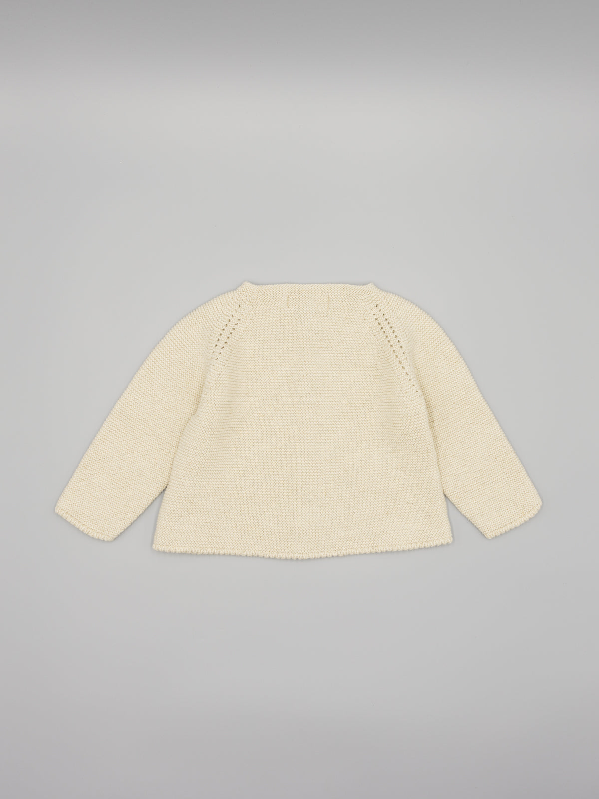 Casaco em malha bege da Fina Ejerique