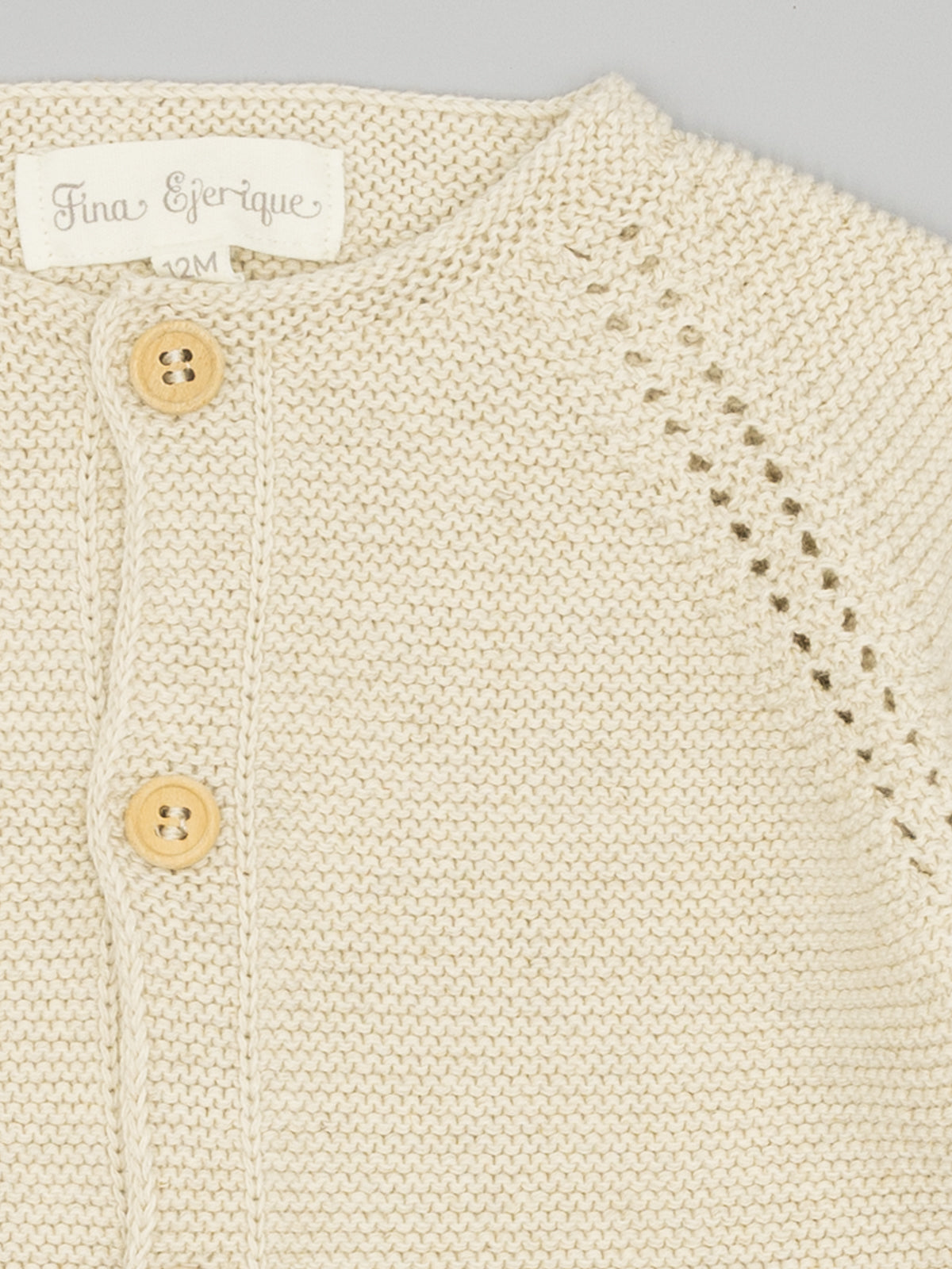 Casaco em malha bege da Fina Ejerique