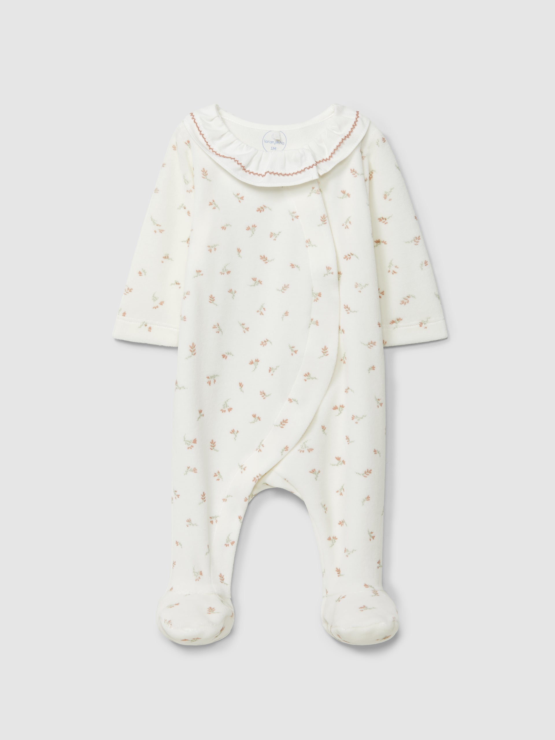 Babygrow de veludo com estampa floral e gola com babados da Laranjinha