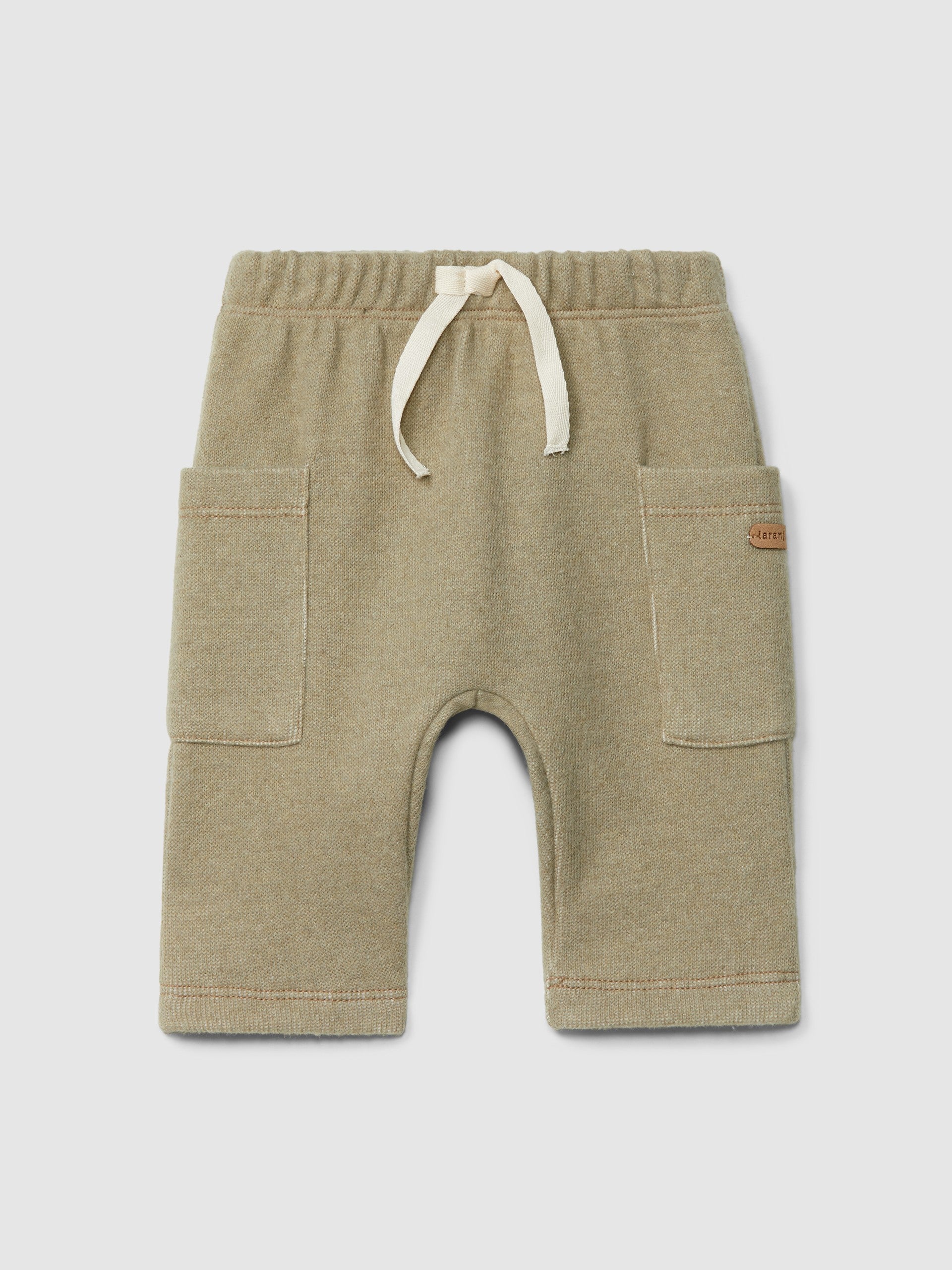 Conjunto camisola bege com carrinho e calça de malha da Laranjinha