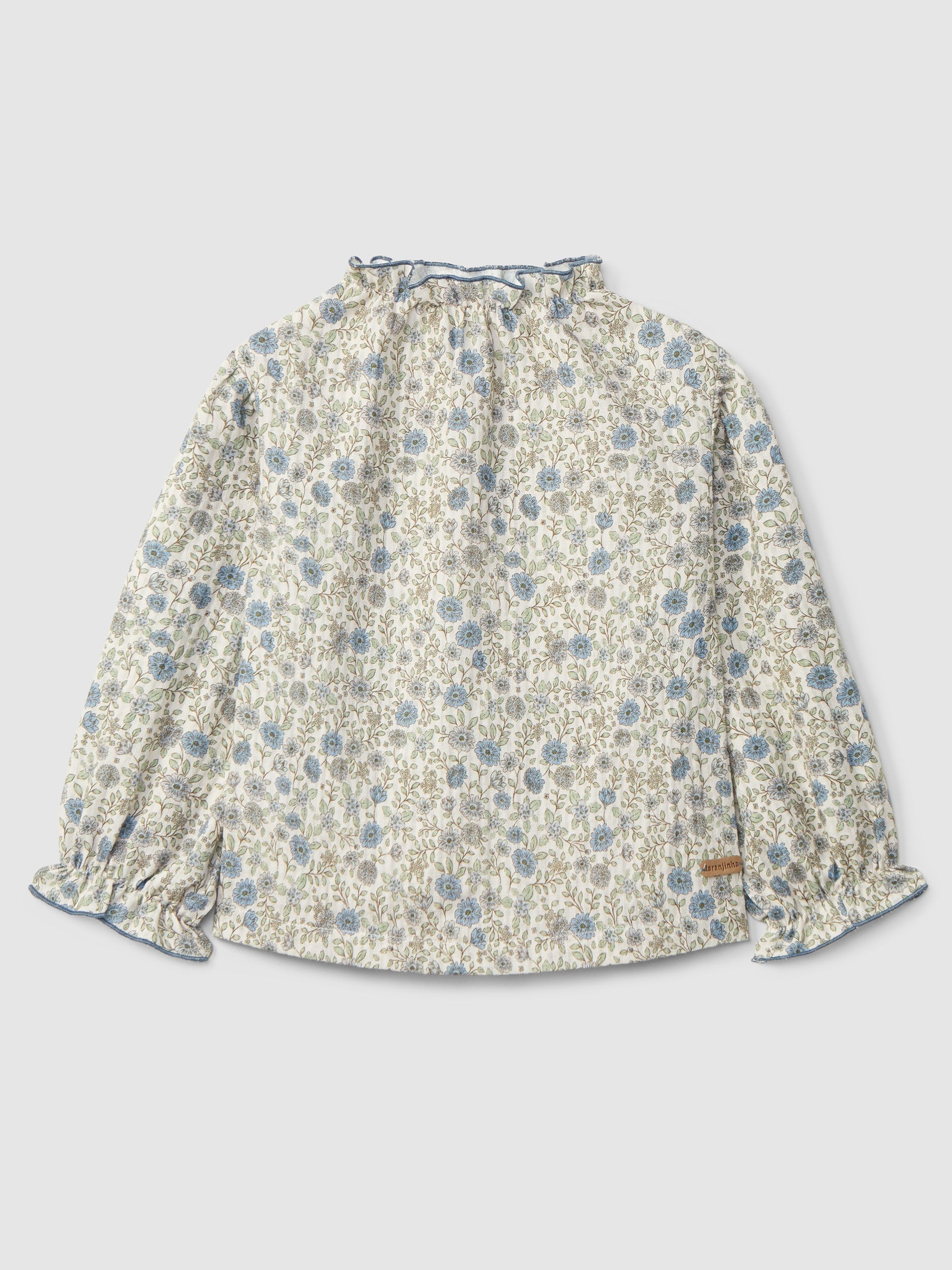 Blusa flores com detalhe de folho da Laranjinha