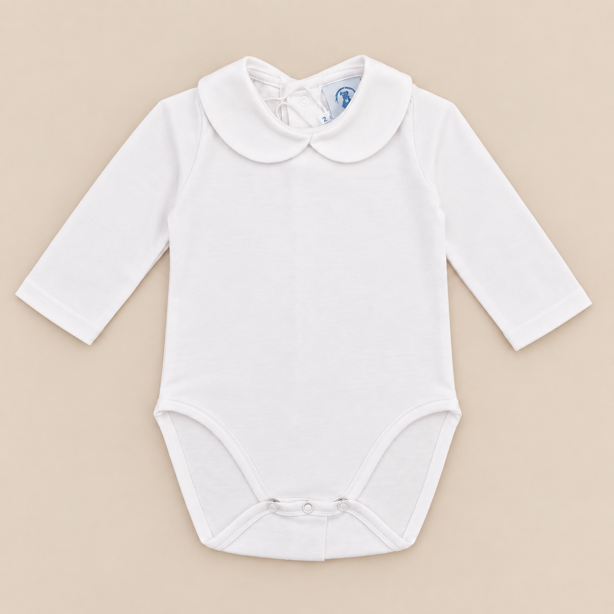 Body branco com gola pique da The Baby Concept